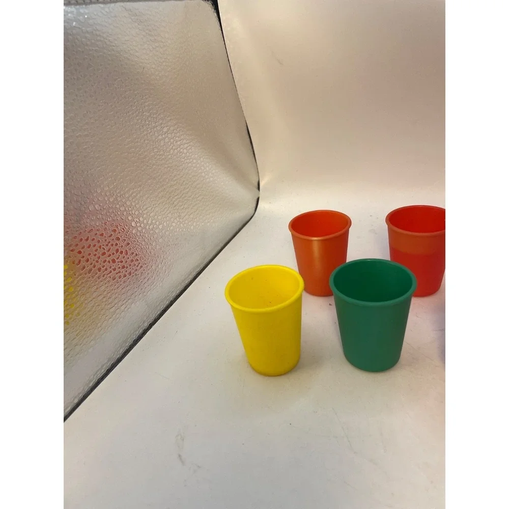 1970 vintage Tupperware  Toys  10 Piece;Orange pitcher with lid 4 cups 4 glasses